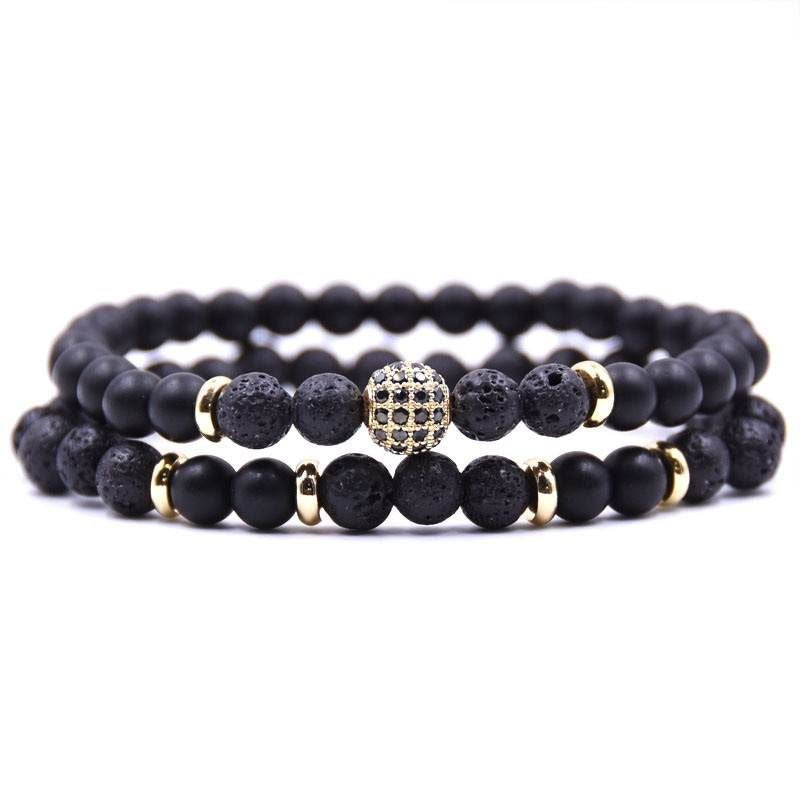 Schwarzes Herren Armband Set aus Vulkanstein und Onyx Stein mit goldenen Details