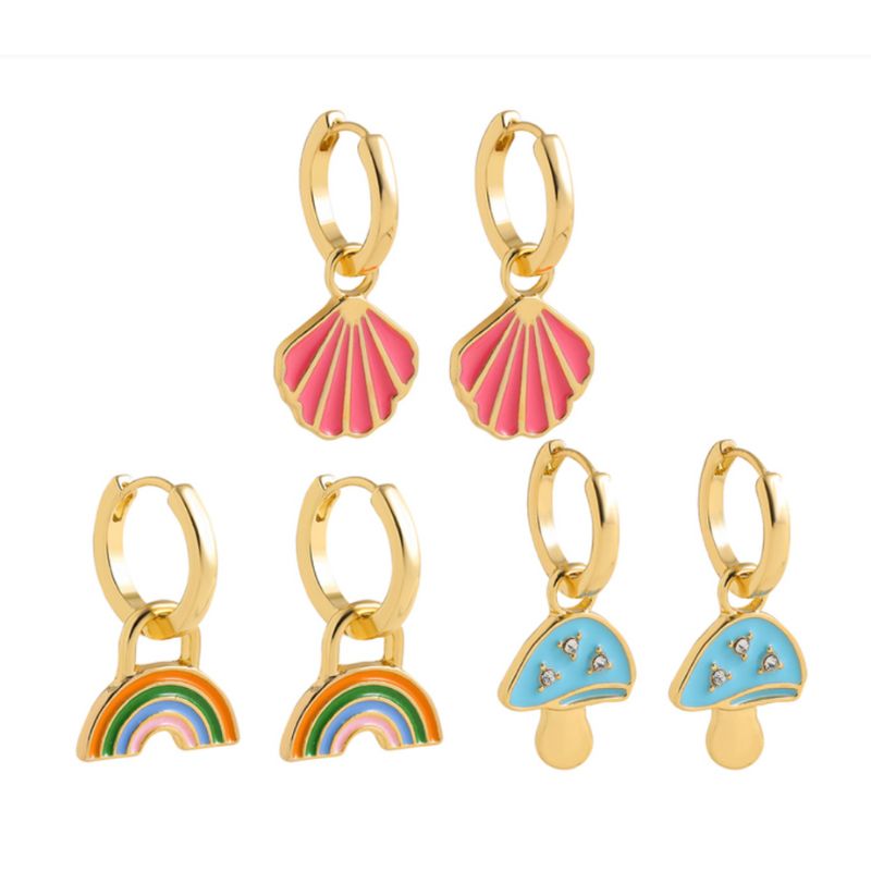 Drei Paar trendige Ring-Ohrringe mit verschiedenen Symbolen