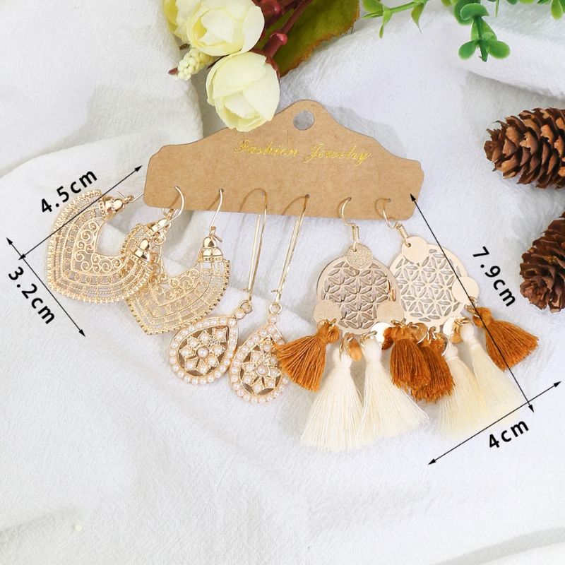 Goldene Boho Hippie Ohrringe mit Pompom Federn Anhängern und anderen Symolen - Boho Chic Modeschmuck Ohrringe 