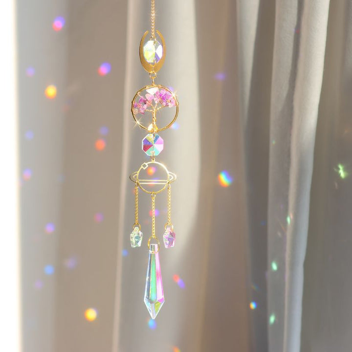 Sonnenfänger in gold mit Mineralsteinen und Baumsymbol sowie Planeten und Sonnen Motive
