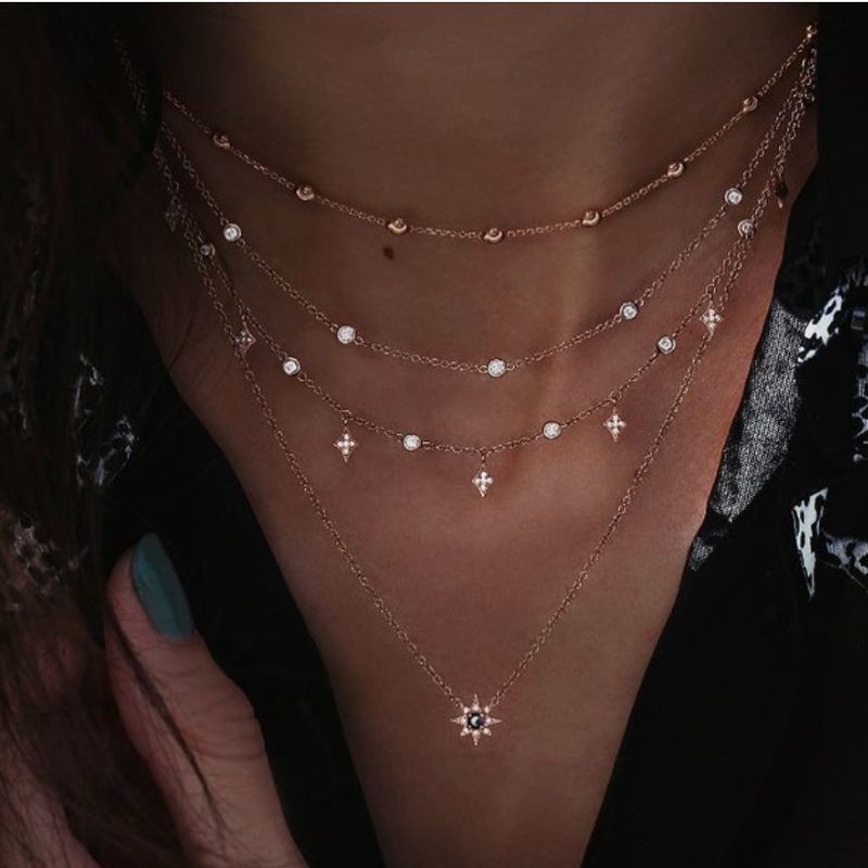 Halsketten Choker Set aus 4 diversen feinen Ketten mit Glitzer Details