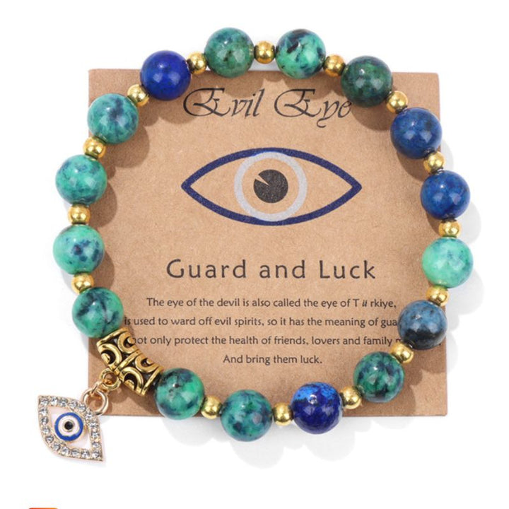 Türkis Blaues Edelstein Armband mit goldenen Detiails und Auge Anhänger mit Glitzersteinen 