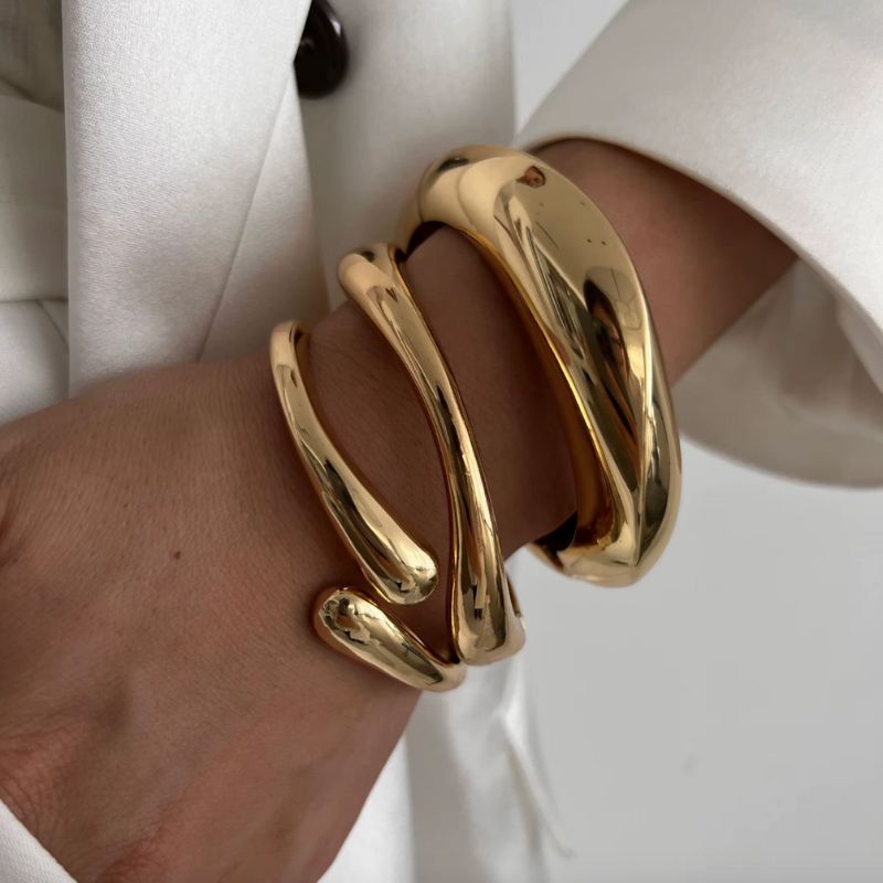 stillvolle goldene Armketten in gold - Klobiges Design mit Manschetten zum Oeffnen 
