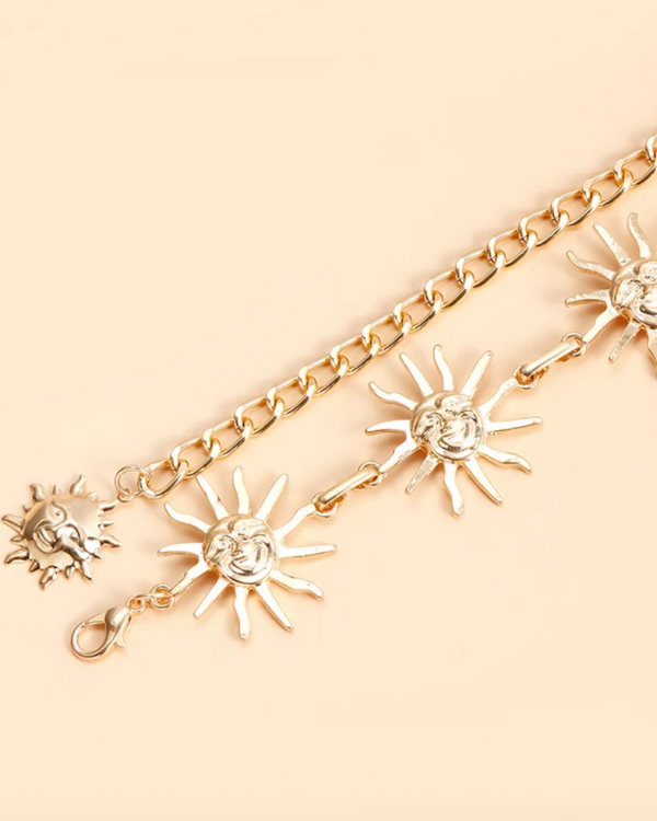 Goldener Bodychain Ibiza Look mit Sonnen Symbol 