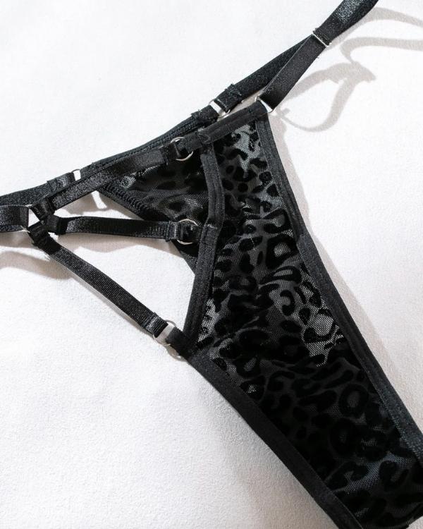 erotischer String Tange mit Bondage Design und schwarzem Leopard Print 