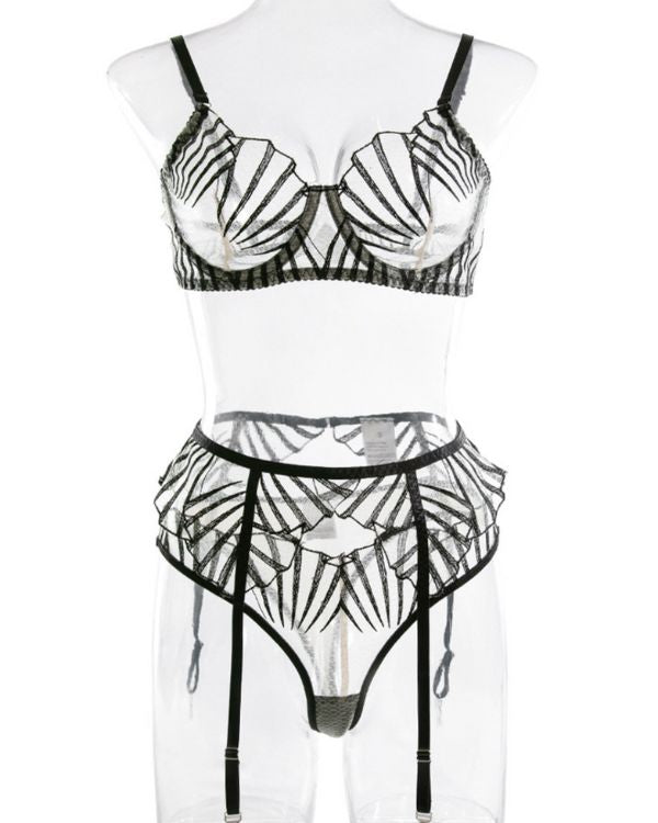 Erotische Reizwäsche aus transparentem BH, String Tanga und Strapsen Halterung mit Muschel Motiven 