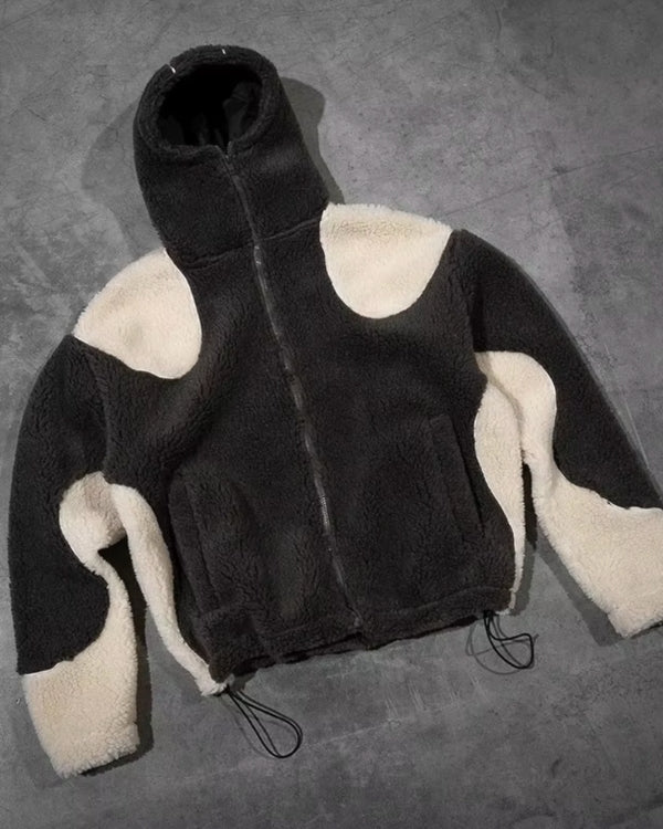 Stillvolle schwarz-weiss Fleece Kapuzen Jacke