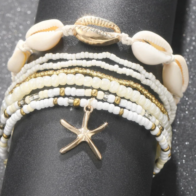 Mehrlagige Fusskette in Gold und Weiss mit Seestern und Muschel Motiv 