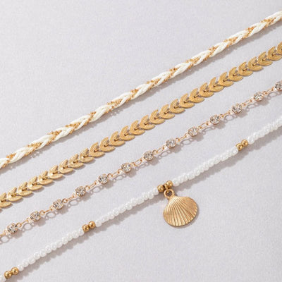 Strand Boho Fussketten Set aus 4 diversen feinen Ketten - eine Kette mit Muschelanhänger 