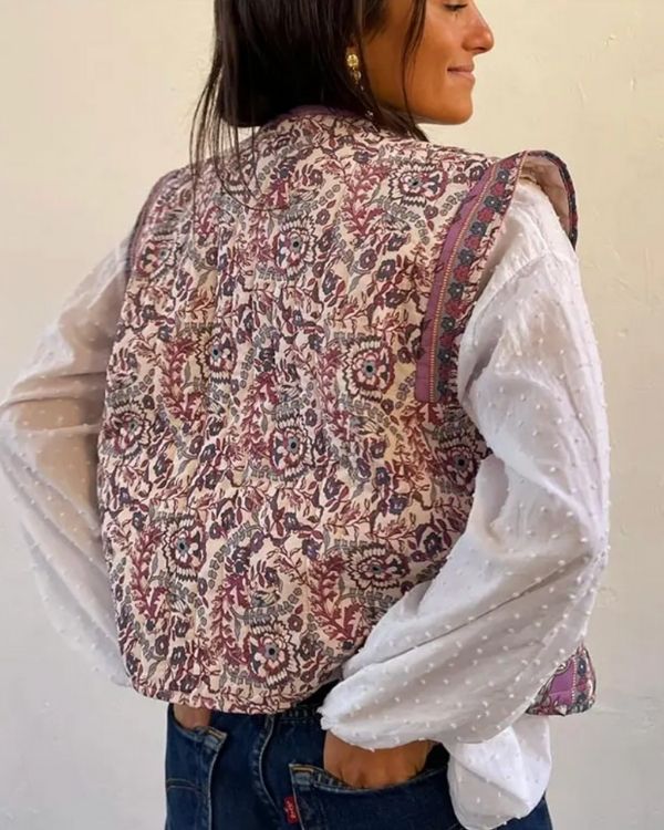 Stillvolle Damen Steppweste mit Blumen Muster und Violett Töne 