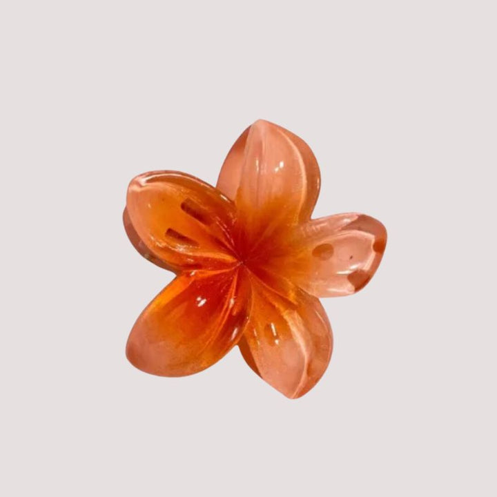 Orange Blumen Haarklammer im Lotus Design 