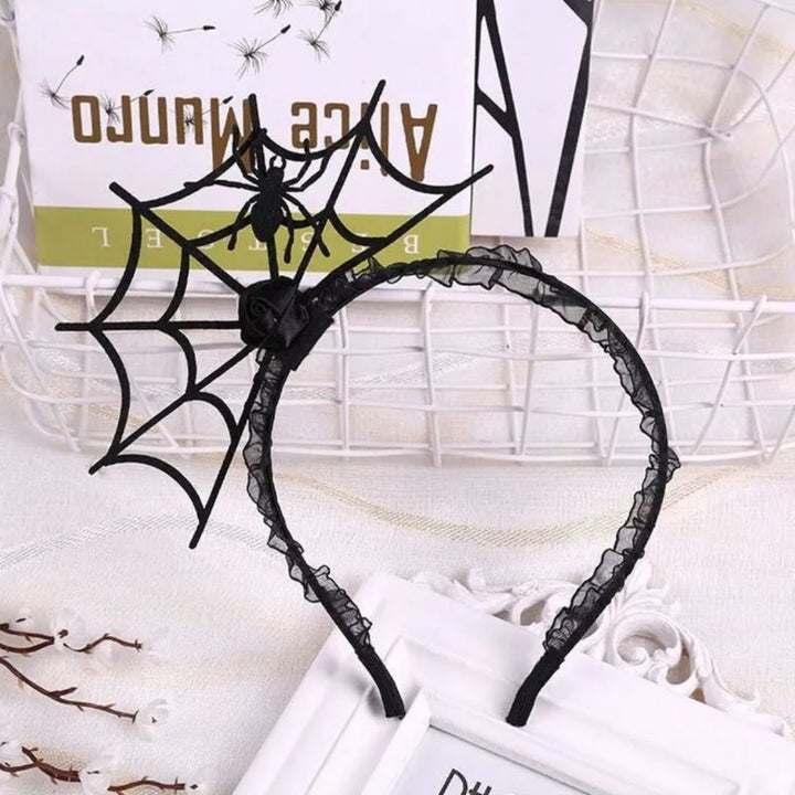 schwarzer Haarreifen mit Spinnen Netz Symbol und Spinne 
