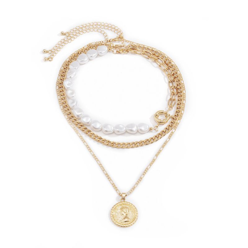 Modeschmuck Halsketten Set aus 3 diversen Ketten mit Perlen und goldenen Ketten 