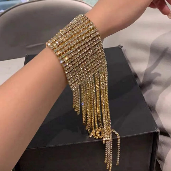 Goldenes Kristall Glitzer Armband Modeschmuck mit Glitzer Fransen - Elegantes breites Armband 