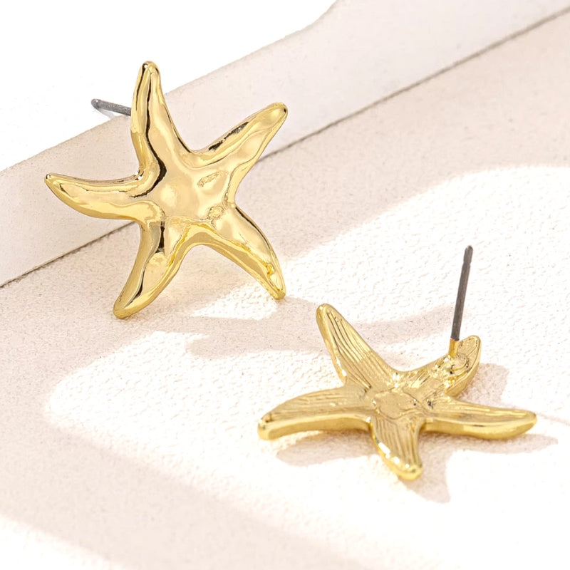 goldene Ohrstecker mit Seestern Design