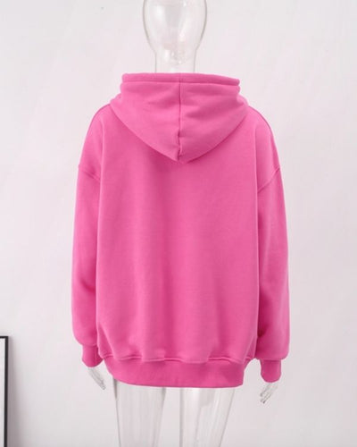 Kuscheliger pinker oversize Pullover mit Kapuze und Kängeruutasche 