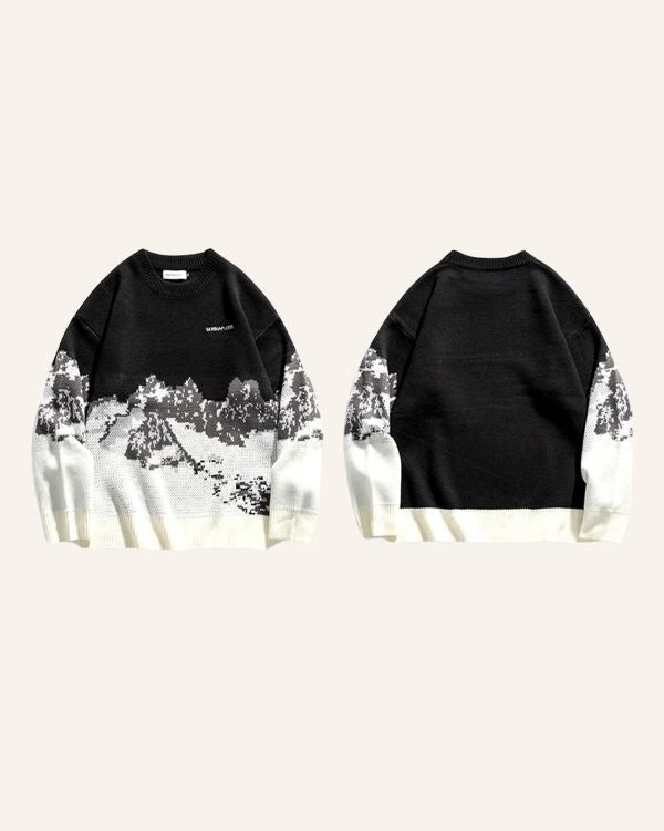 Moderner schwarz-weisser Pullover mit Bergmotiven 