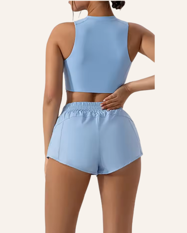 Running-Outfit für sommerliche Trainings | hellblaues Damen Gym Set mit kurzen Shorts und Top