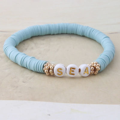 hellblaues Soft Perlen Armband elastisches Gummiband und Sea Buchstaben