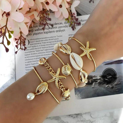 Armreifen Set Armband aus goldenen Reifen mit Muschel Symbolen 