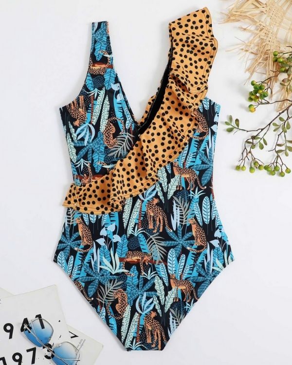 Badeanzug in blau Toenen im Safari Style - Femininer Look mit verspieltem Muster und rüschenverziertem Detail