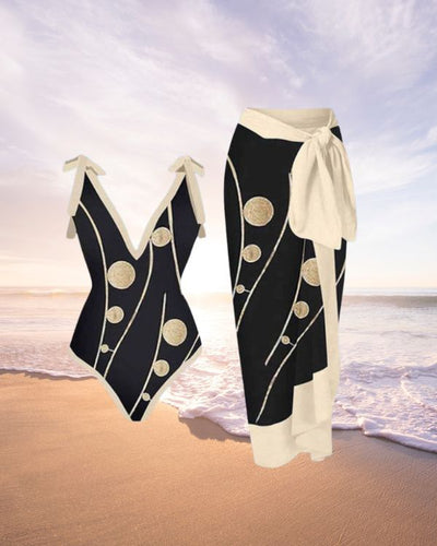 Badeanzug mit Pareo Wickelrock in schwarz mit creme-weissem Rand und goldenen Kreisen Dots