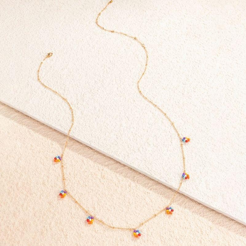 goldene feine Bauchkette mit farbigen Blumenperlen 