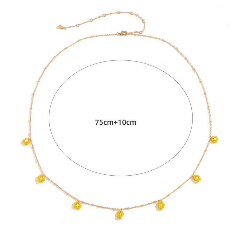 goldene Bauchkette mit gelben Blumenperlen