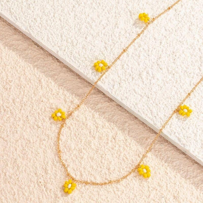 goldene Bauchkette Koerperschmuck mit gelben Perlenblumen