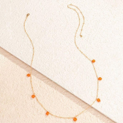 goldene Bauchkette mit orangen Vintage Retro Blumen aus kleinen Perlen
