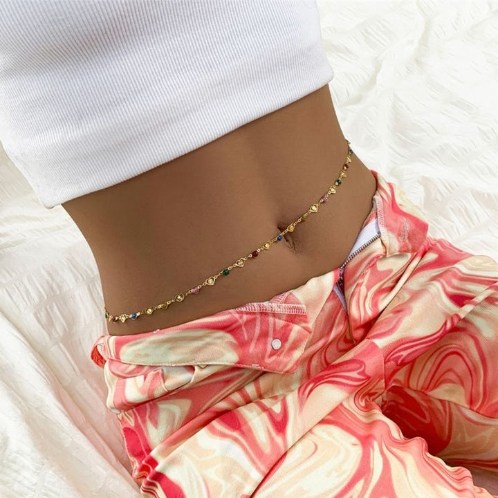 Modeschmuck Bauchkette in gold mit Herz Symbol und farbigen Steinen - Feine Bauchketten online kaufen