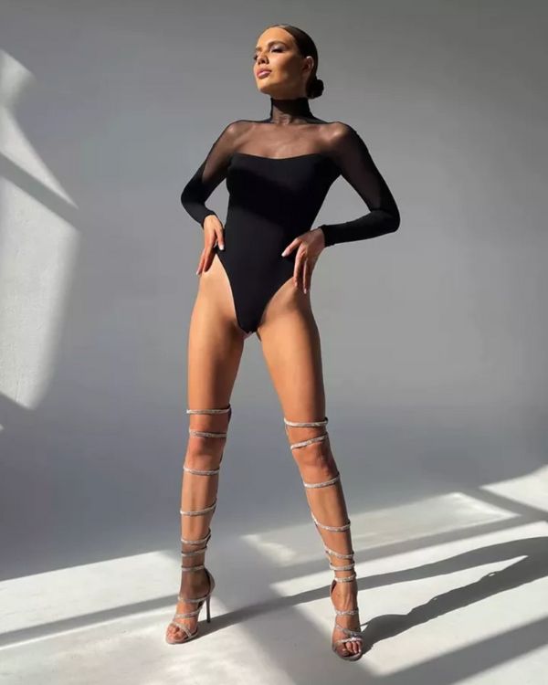 Schwarzer Mesh Bodysuit Damen Body mit hohem Kragen und transparenten Cut-Outs