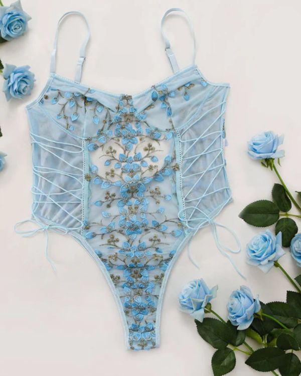 Mesh Bodysuit hellblau mit Blume Muster und zum Schnuerren auf den Seiten 