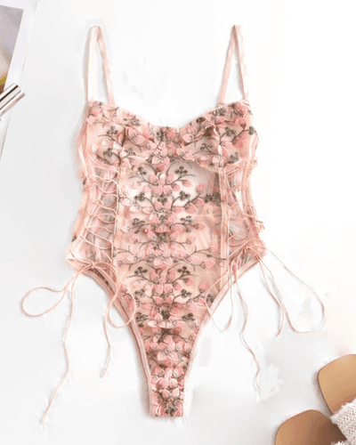 Rosa Transparenter Korsett Bodysuit zum Schnürren auf der Seite und mit schönen Blumen Stickereien