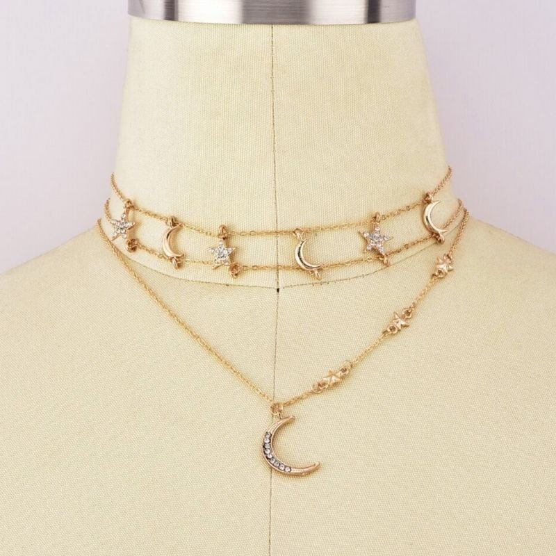 Feine goldene Modeschmuck Halskette Choker mit Stern und Mond Symbolen 