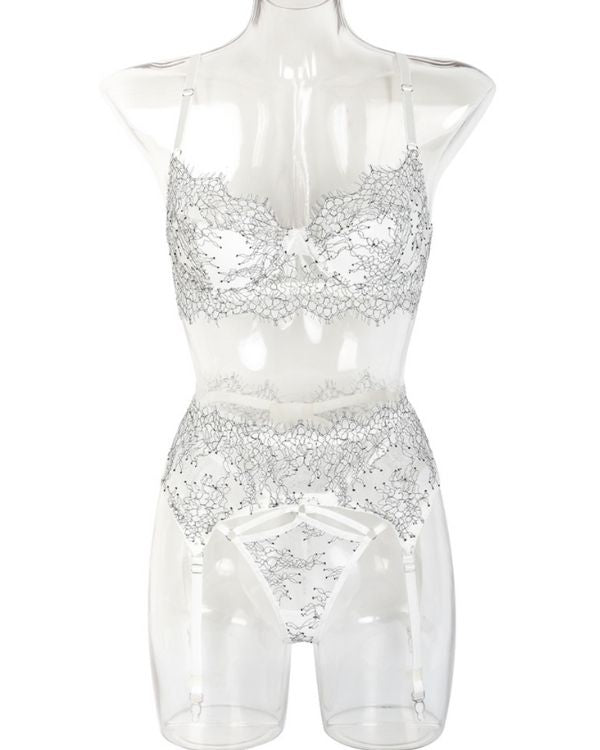 Weisses Spitzen Dessous Lingerie Set aus String Tanga mit Strapsen Halterung und BH 