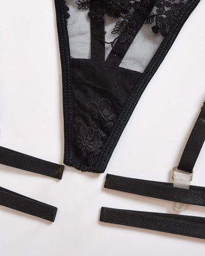 Schwarze Strapsen mit String Tanga