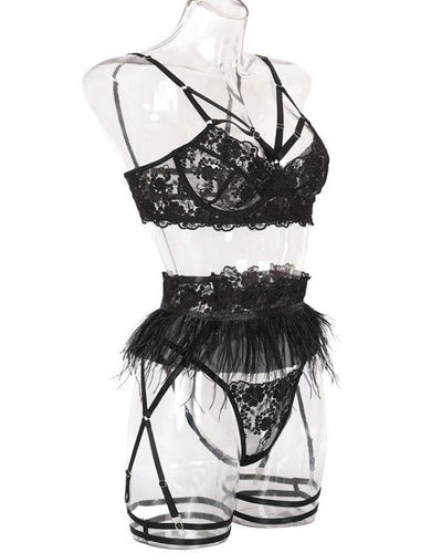 Schwarze Dessous Set aus Bandage BH String Tange und Strapsen Halterung 