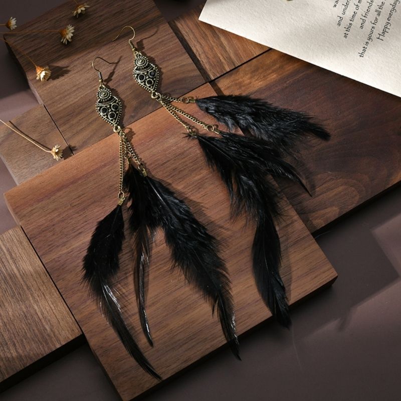 Schwarze Boho Hippie Ohrringe mit Ethno Anhaenger 