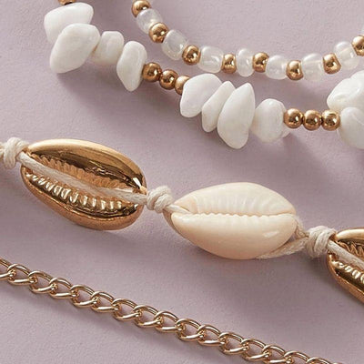 Muschel Ketten aus weissen und goldenen Muscheln