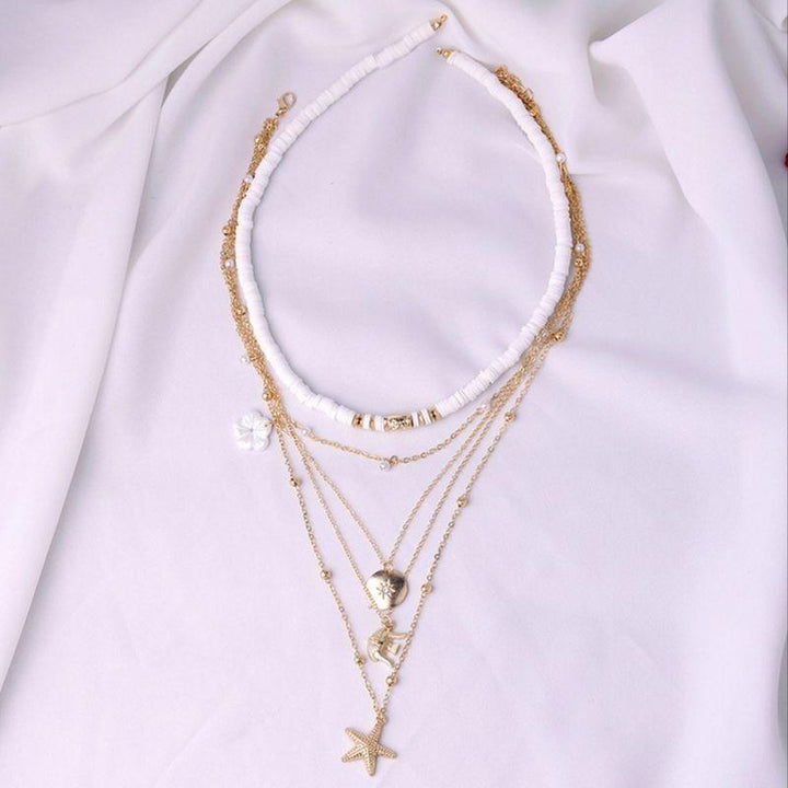 Halsketten Choker Multilayer Set - goldene feine Ketten und weisse Choker Kette im Beach Style - Modeschmuck Schweiz online kaufen