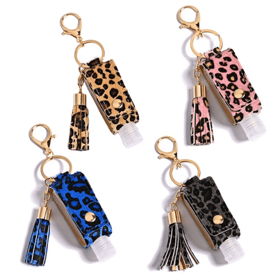 Hand Desinfektionsmittel Spender aus Kunst Leder mit Leopard Muster und Fransen