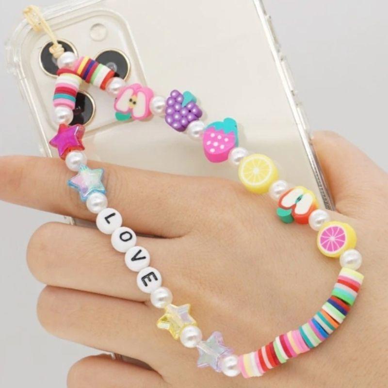 Farbige Handykette aus Fruechten und Sternen - Bunte Perlenkette fuer Smartphone Case