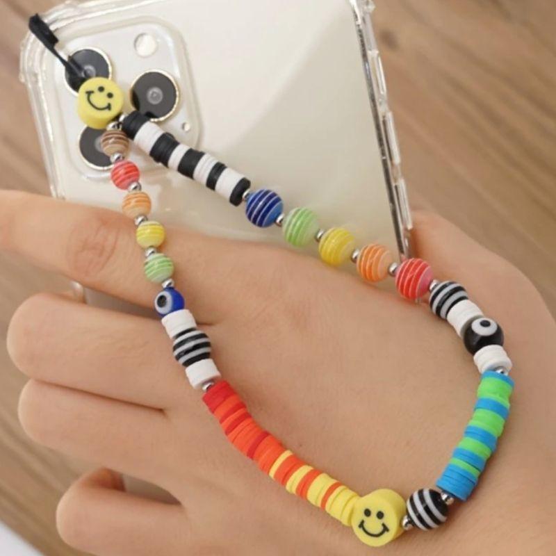 Farbige Perlenkette aus bunten Clay und Acryl Perlen mit Smiley Symbolen - Handykette fuer Smartphone Cover Case