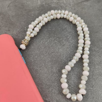 weisse Perlen Handykette aus schönen eleganten Perlen mit goldigem Detail am Ende