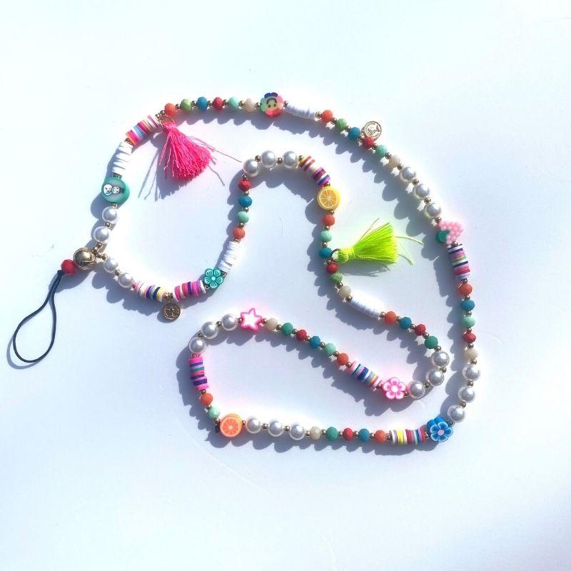 Farbige Bunte Handykette mit Pompoms und Frucht Symbolen