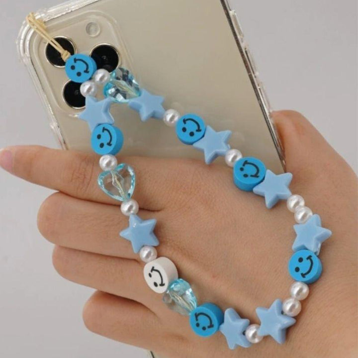 Handykette aus blauen Perlen mit Stern, Herz und Smiley Symbolen - Farbiges Smartphone Accessoire 