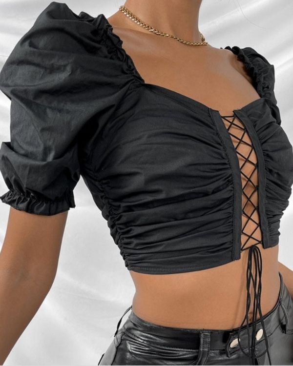Schwarzes Damen Shirt mit Puffer Aermel und Korsett Style