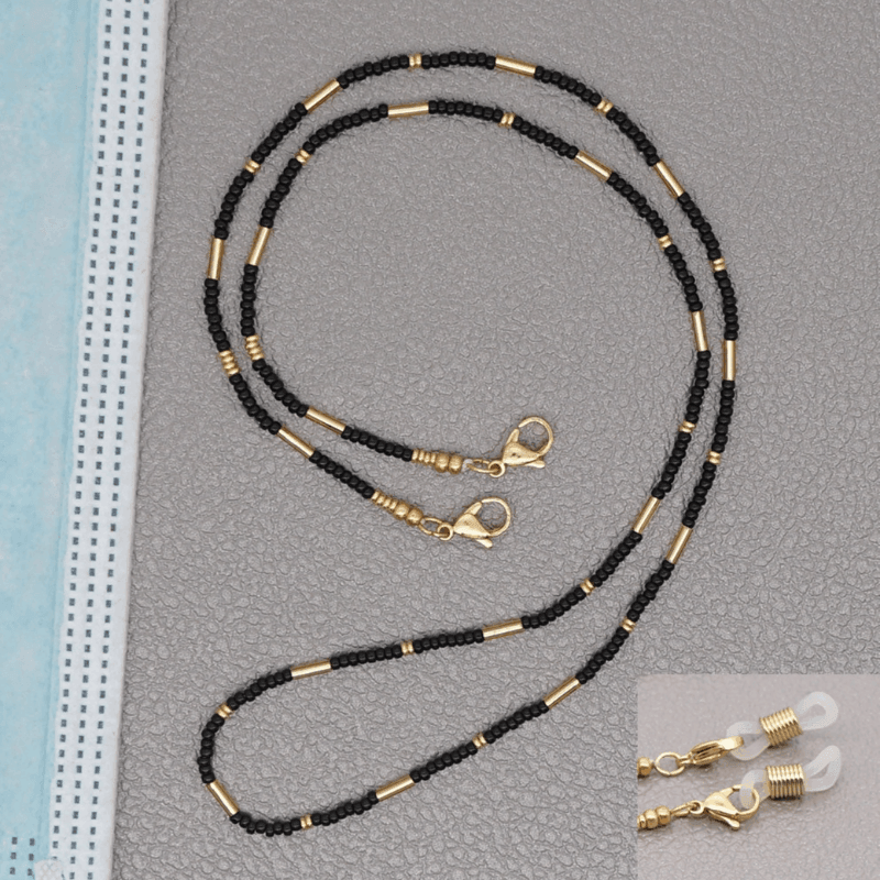 Maskenkette aus schwarzen und goldenen Perlen - Kette für Schutzmasken kaufen