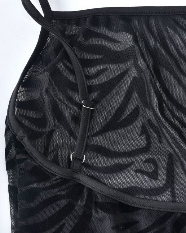 Schwarzes Mesh Kleid mit Spaghetti Traegern und Zebra Muster 